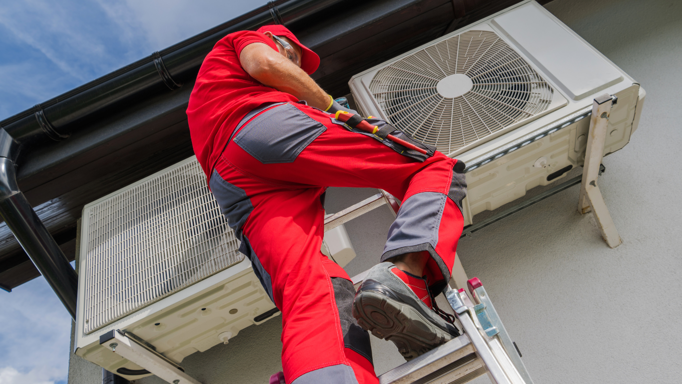 A professional technician from Fast Air Conditioning Repair on a ladder inspecting an outdoor A/C unit to diagnose the source of a loud buzzing or humming noise.